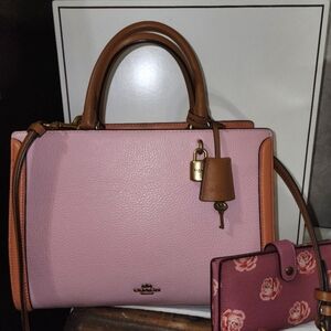 RESERVED.Coach Pink and Tan Satchel with Elegant Design